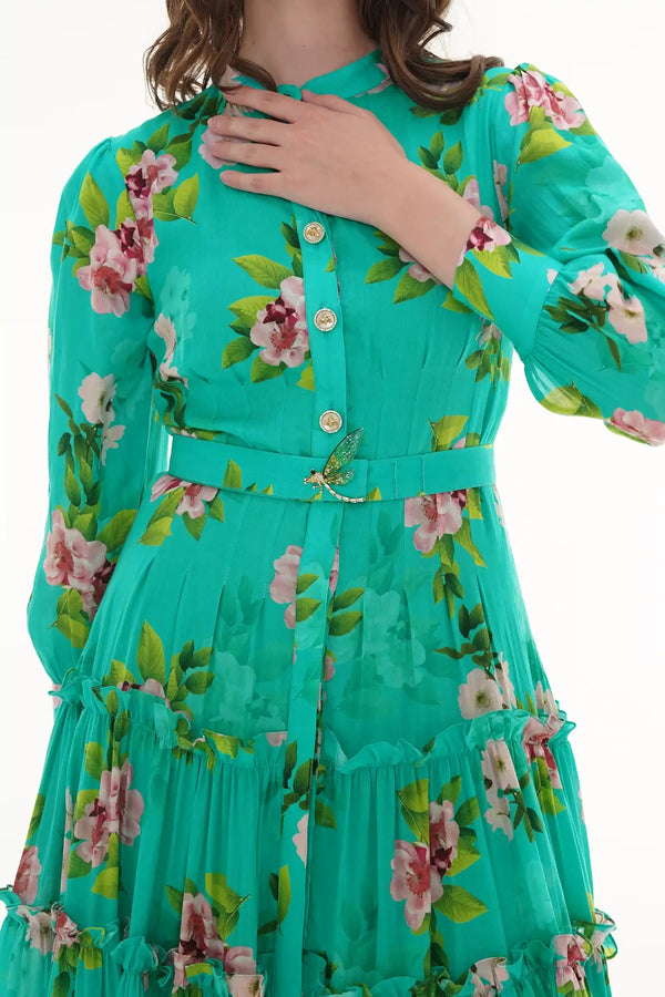 Close-up of Pretty Pixie turquoise floral V-neck puff-sleeve maxi dress, fabric detail