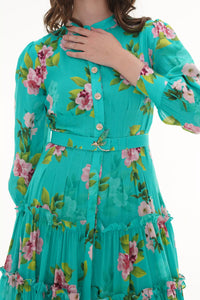 Close-up of Pretty Pixie turquoise floral V-neck puff-sleeve mini dress, fabric detail