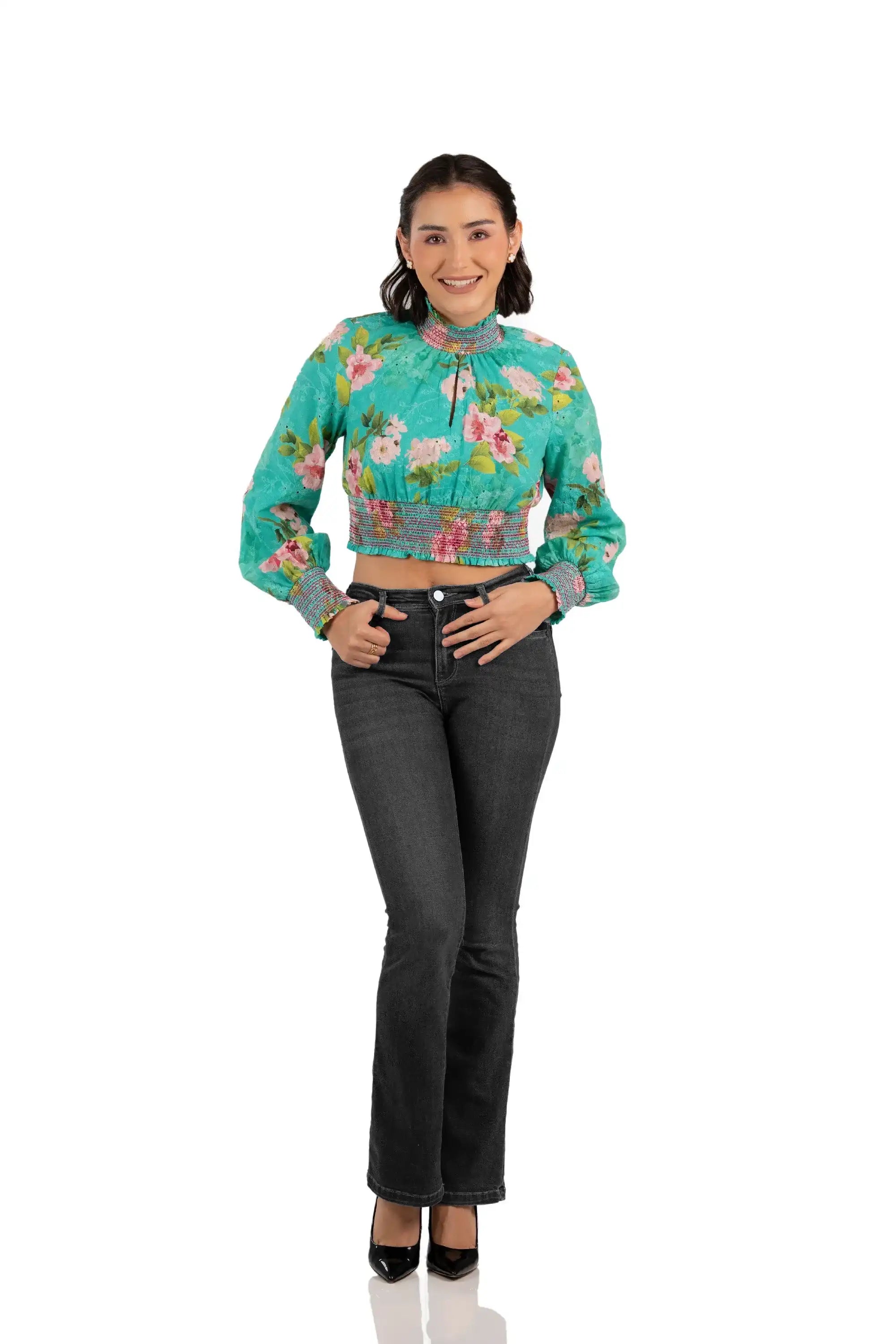 Front view of women's turquoise floral crop top with high neck and smocked waist
