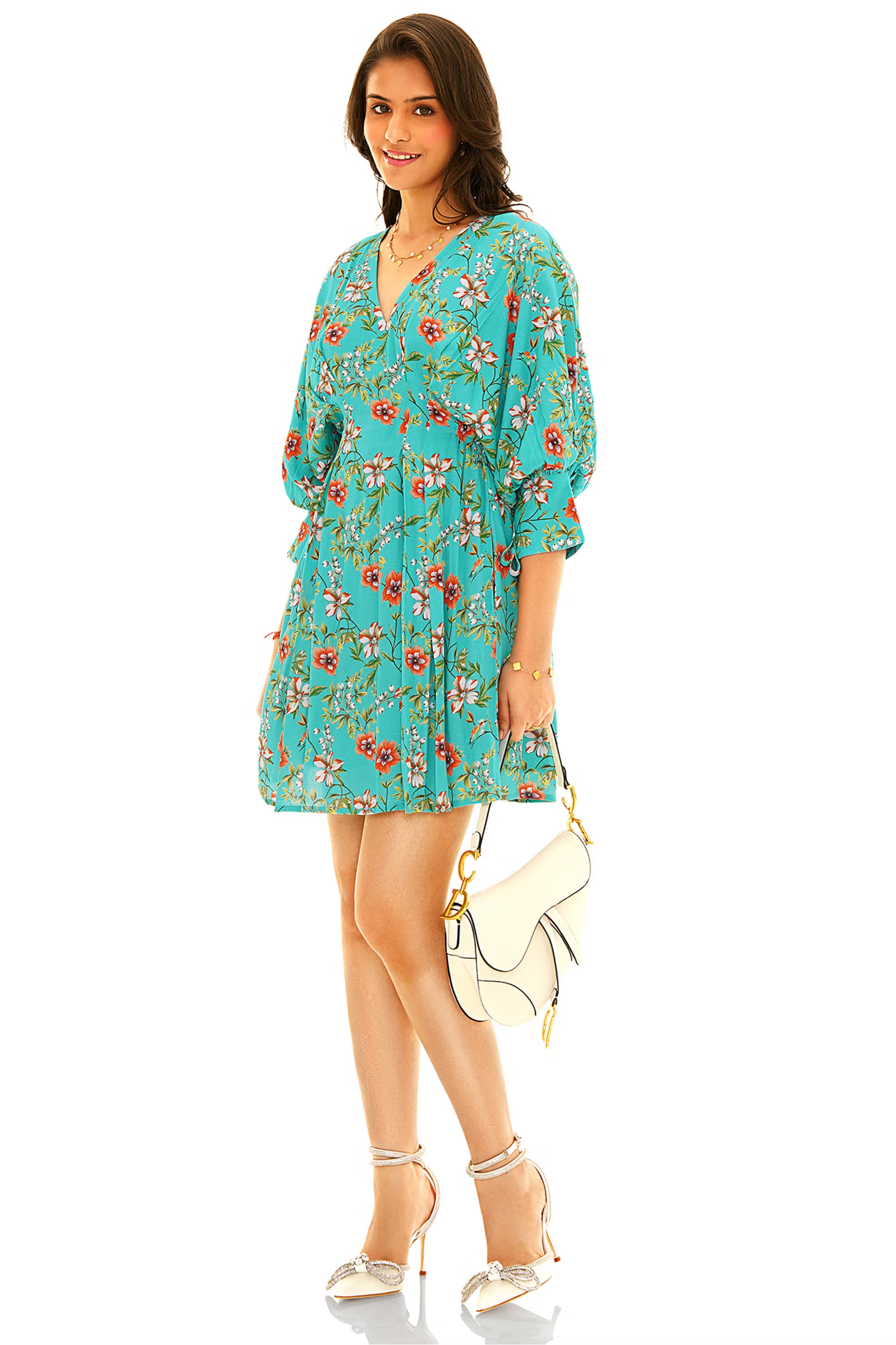 Turquoise floral V-neck puff-sleeve mini dress with flared hem, side view