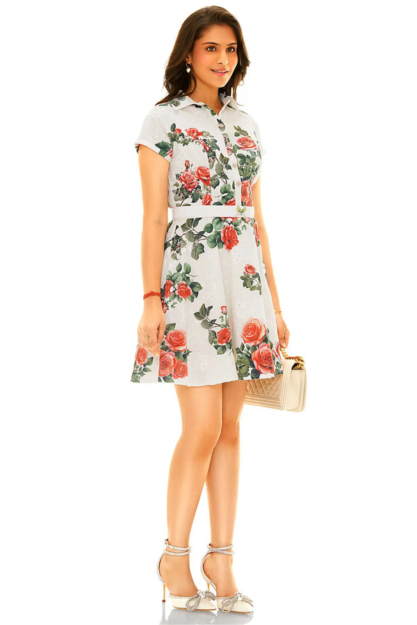 Side view of white floral shirt-style belted mini dress with belt