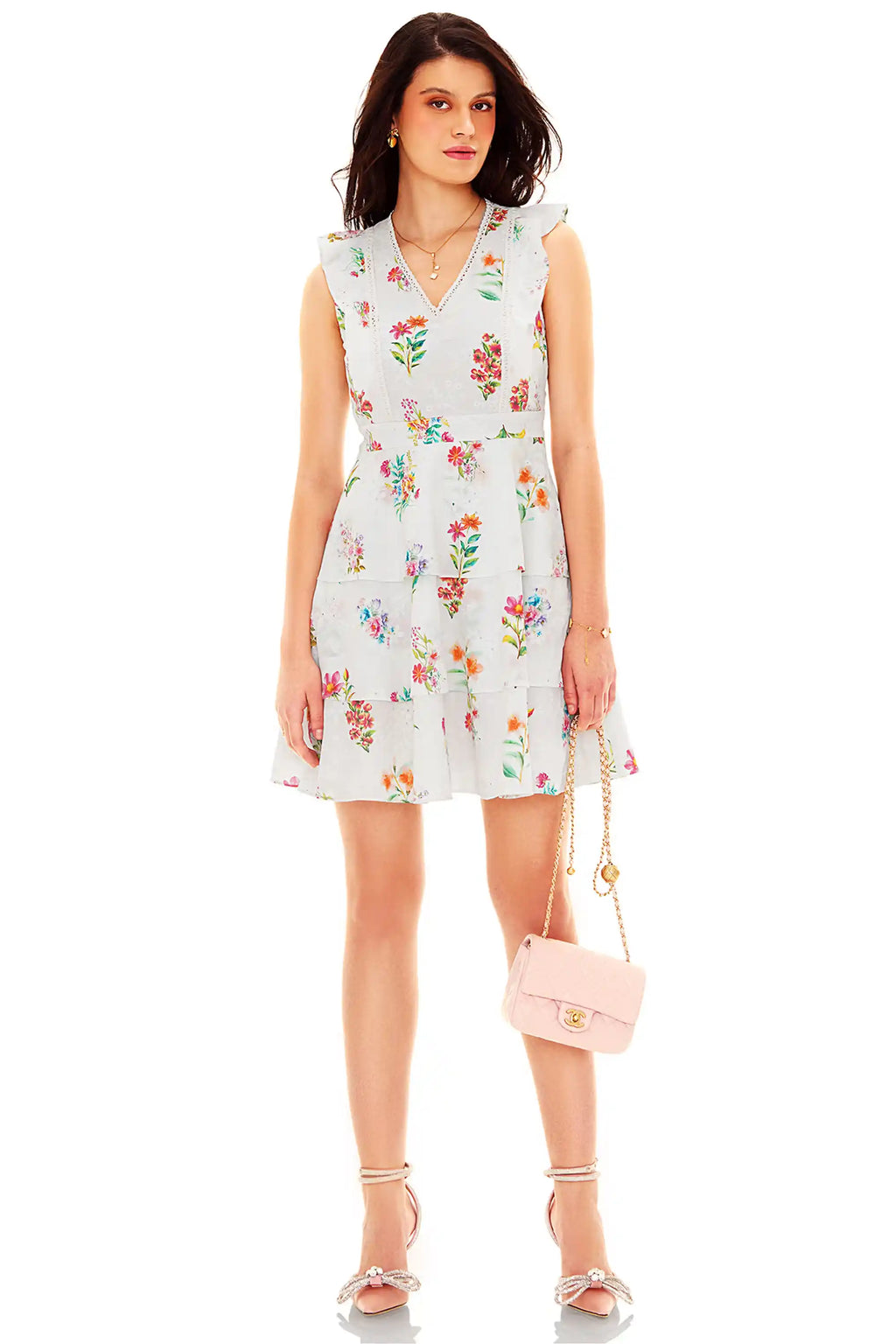 White floral sleeveless mini dress front view with layered ruffles
