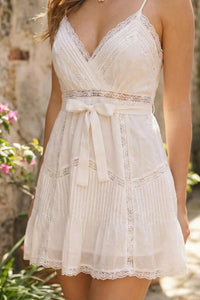 Pretty Pixie ivory lace trim wrap mini dress detail view v-neck lace trim bow waist