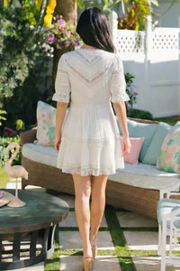 Pretty Pixie white lace trim pleated v-neck tiered mini dress back view puff sleeves