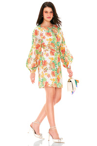 Side view of white mini dress with multicolor floral print and long puff sleeves