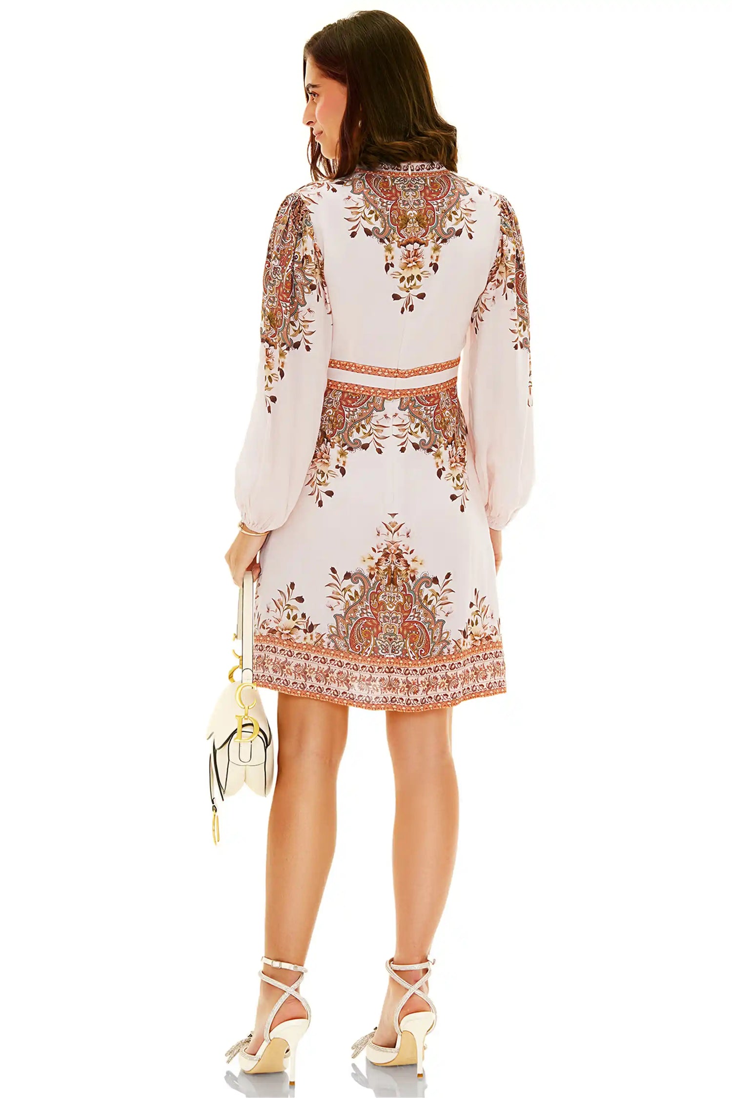 White printed mini dress back view with detailed floral print and long sleeves