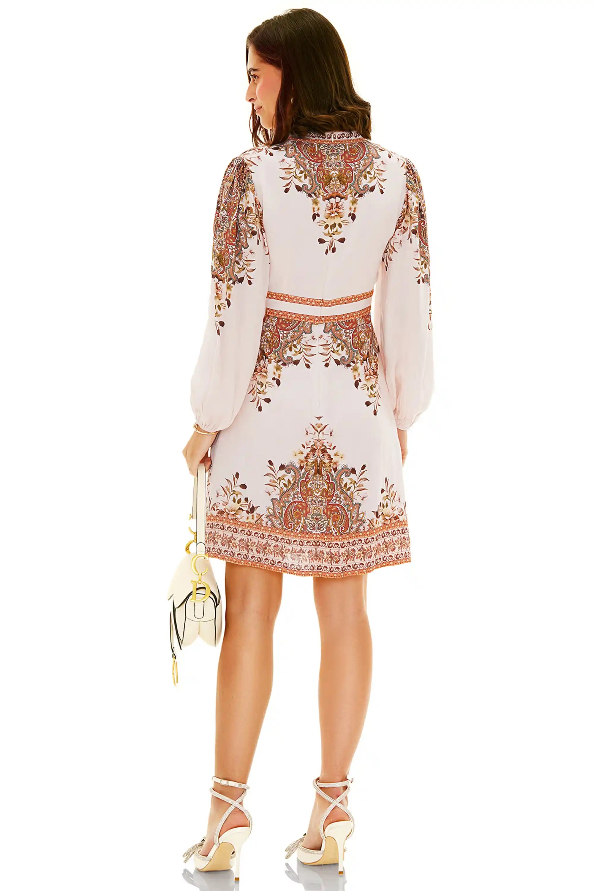 White printed mini dress back view with detailed floral print and long sleeves