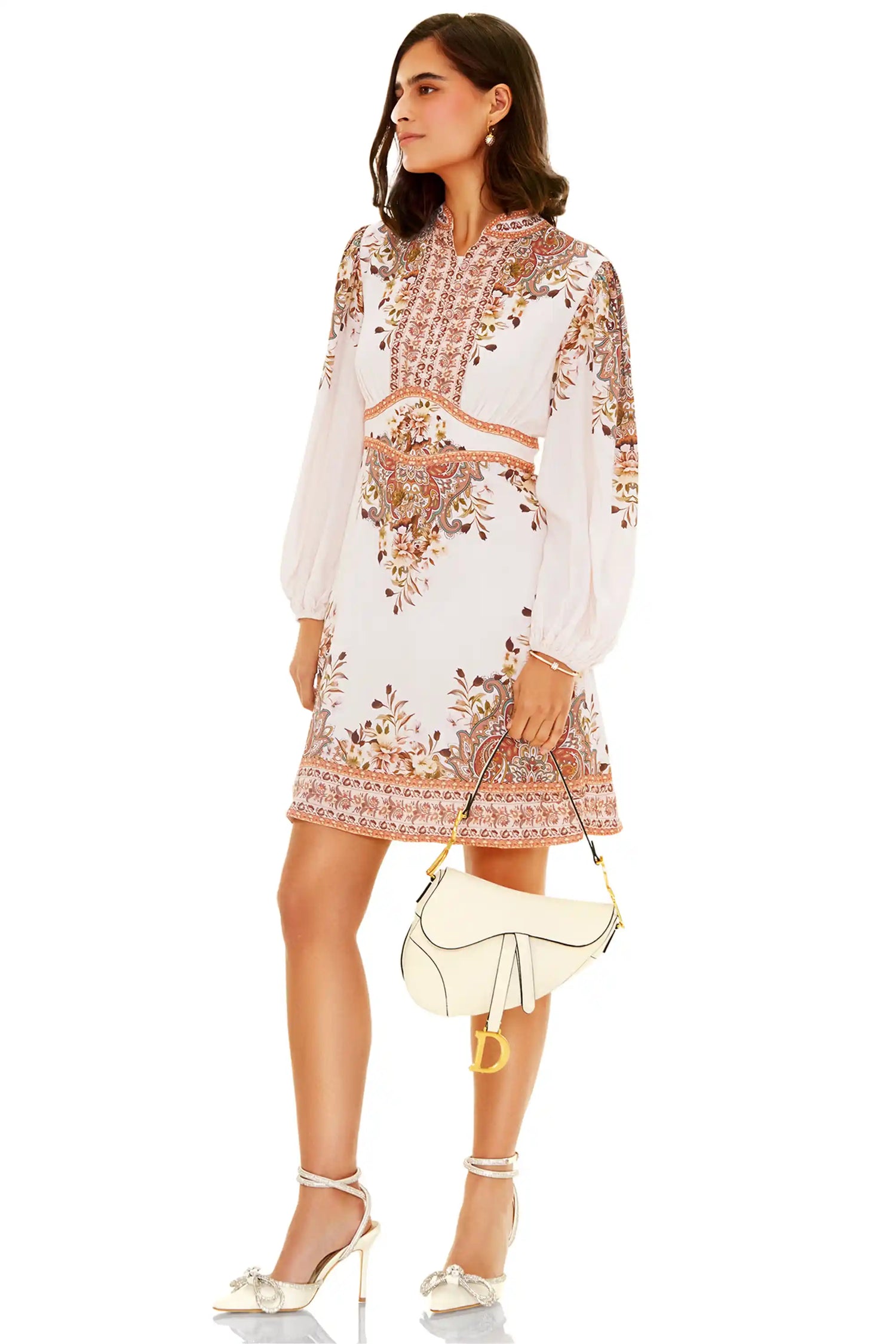 White printed mini dress side view with long sleeves and floral design
