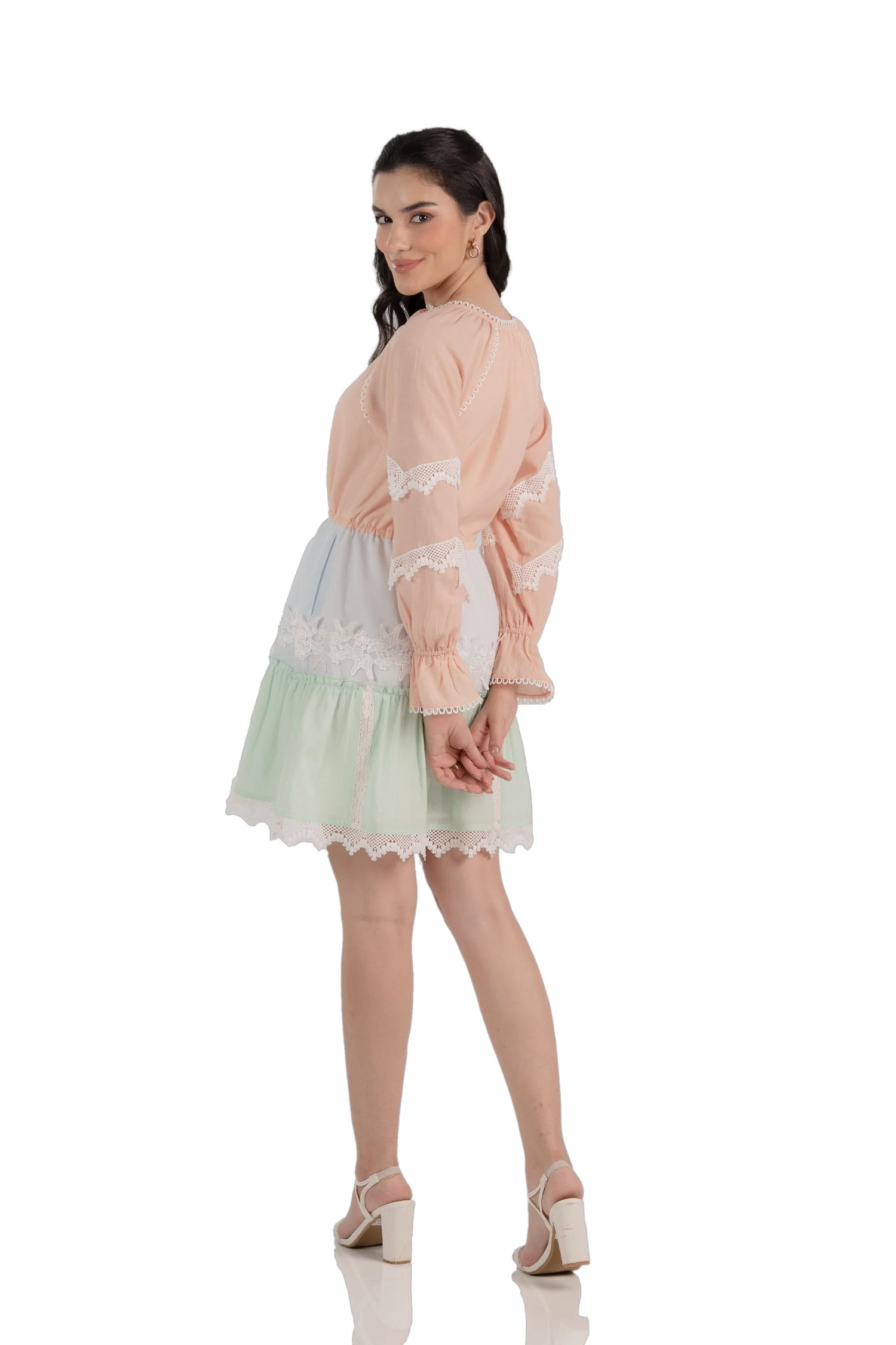 Back view of peach mint tiered mini dress with lace trim and elastic waist