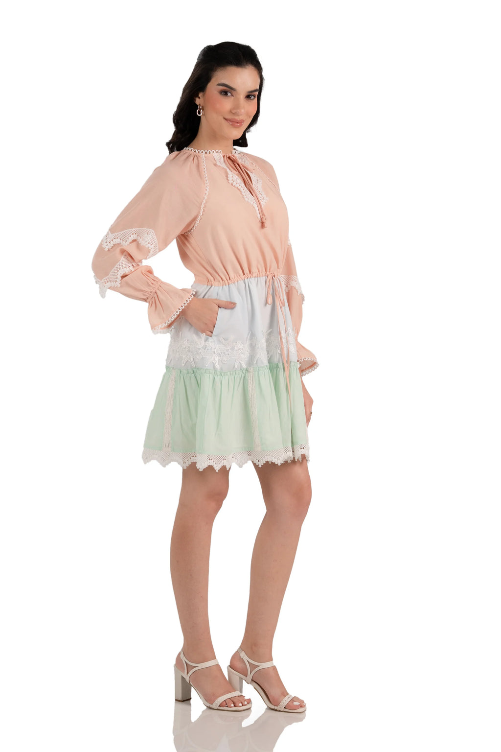 Peach mint lace tiered mini dress, side view with pockets and drawstring waist