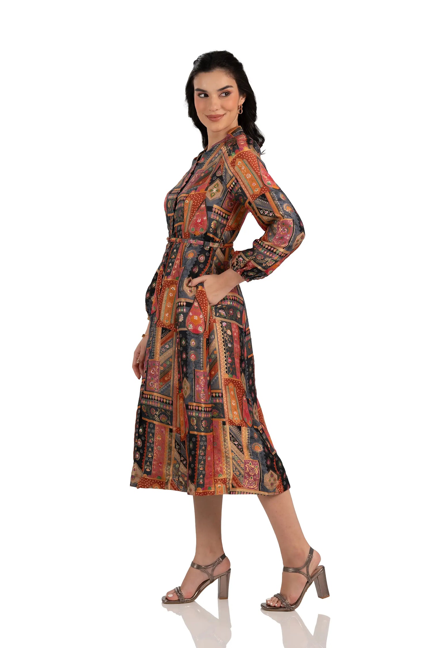 Side view of charcoal boho patchwork midi dress, belted with pockets