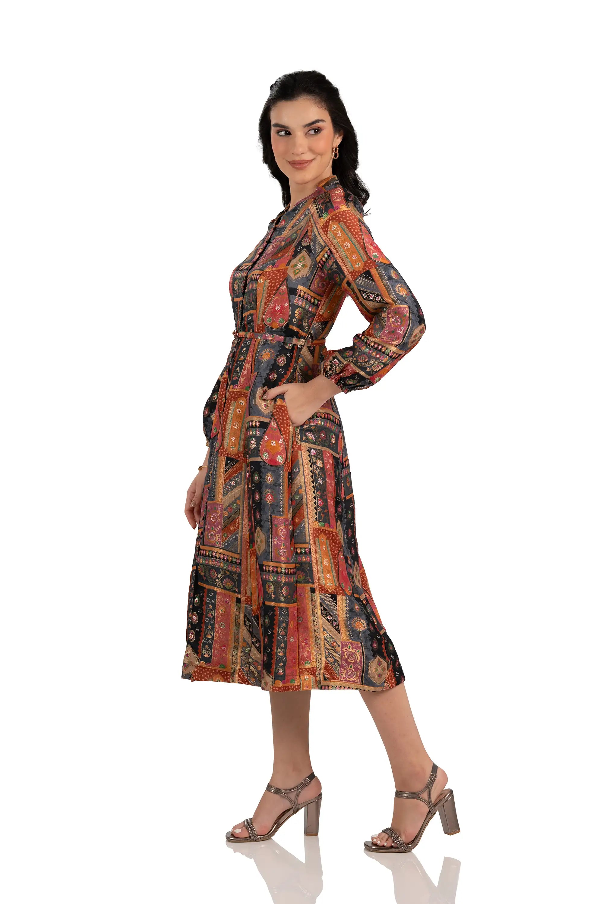 Side view of charcoal boho patchwork midi dress, belted with pockets
