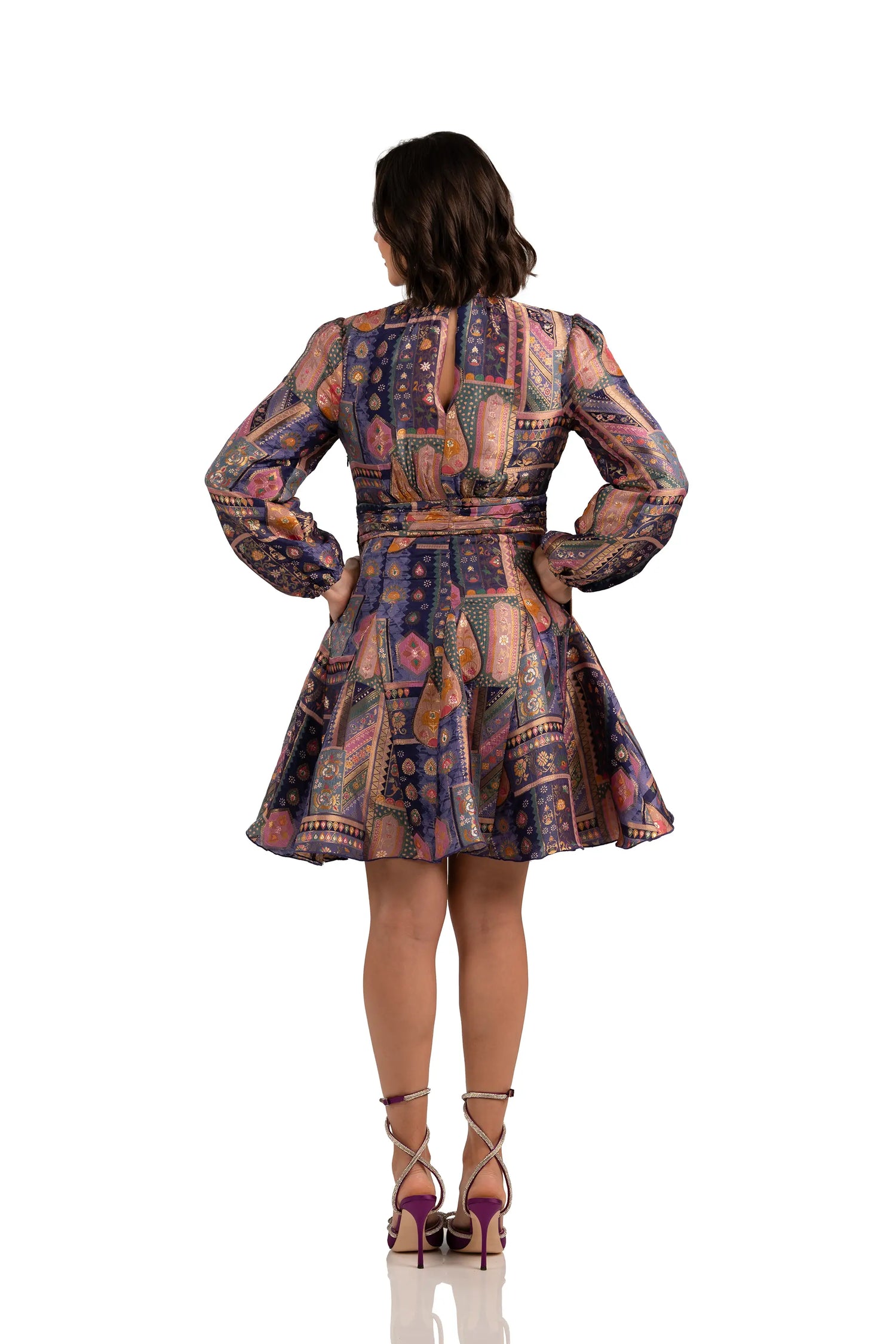 Back view of navy boho patchwork mini dress with belt and keyhole neckline
