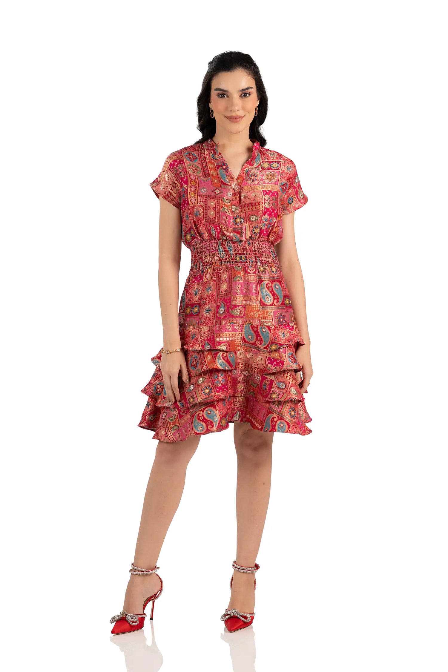 Front view of red boho patchwork mini dress with shirred waist and ruffle hem
