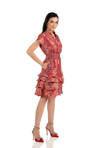 side view of red boho patchwork mini dress with ruffle skirt