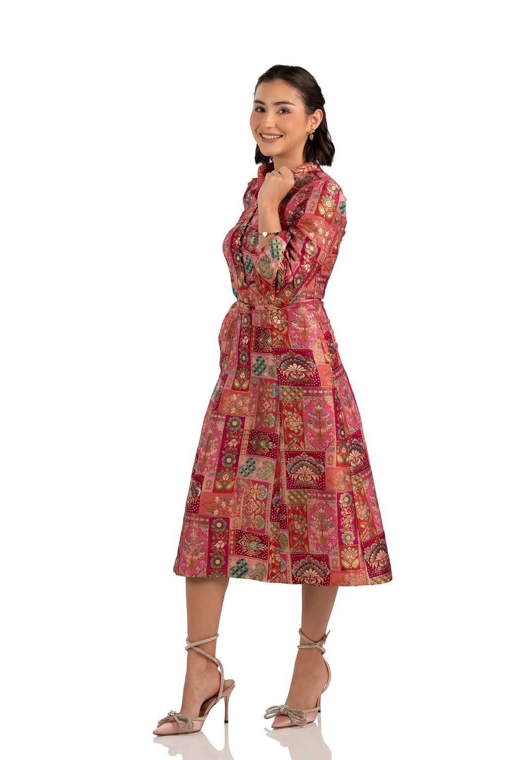 Side view of rose patchwork midi dress with belt, long sleeves and pockets