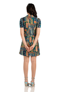 Back view of teal boho patchwork mini shirt dress with short sleeves