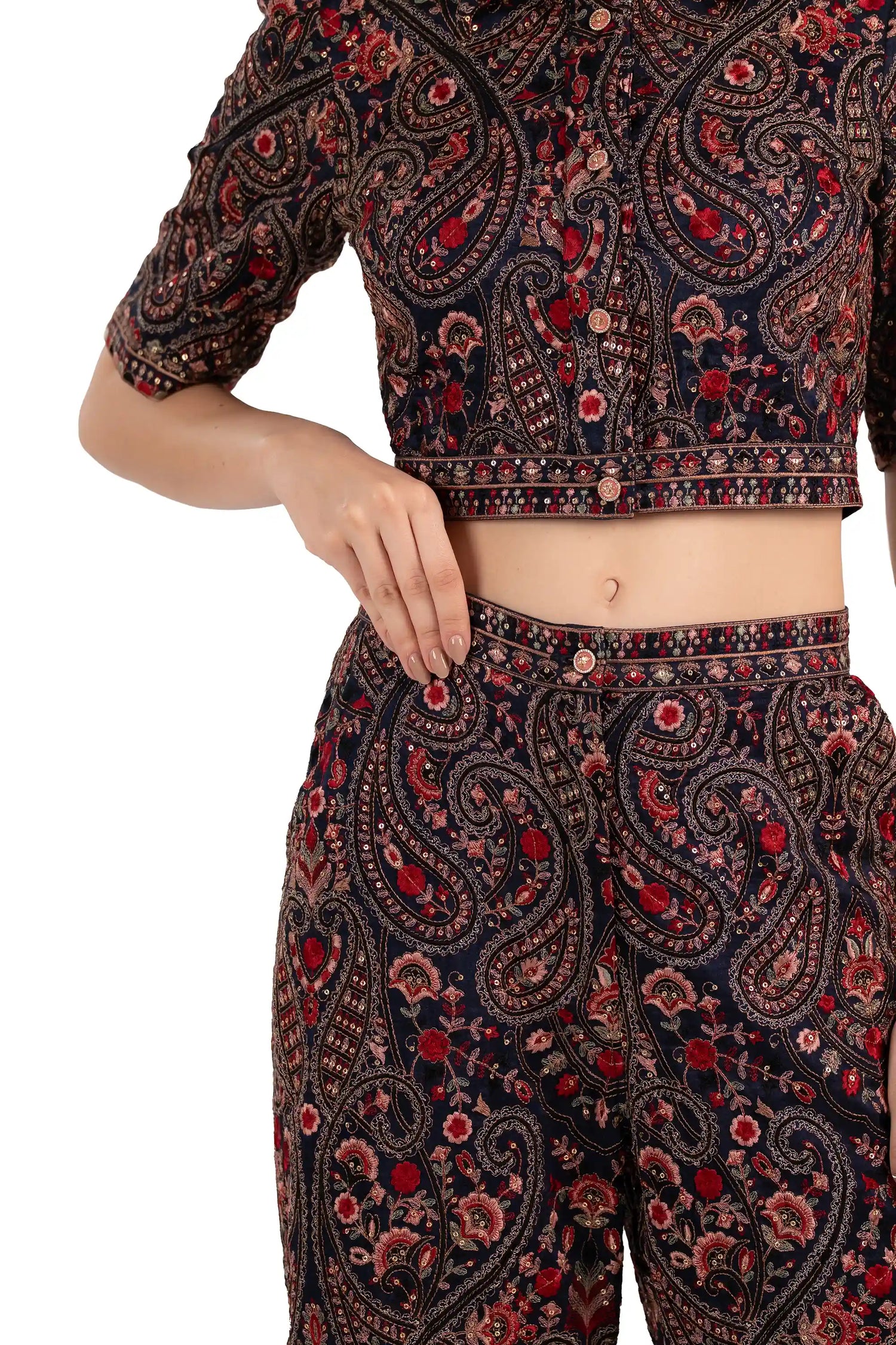 Close-up of navy paisley co-ord set, crop shirt hem and waistband detail