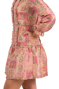 Pink jacquard patchwork mini dress with ruffle trim and pocket, side detail