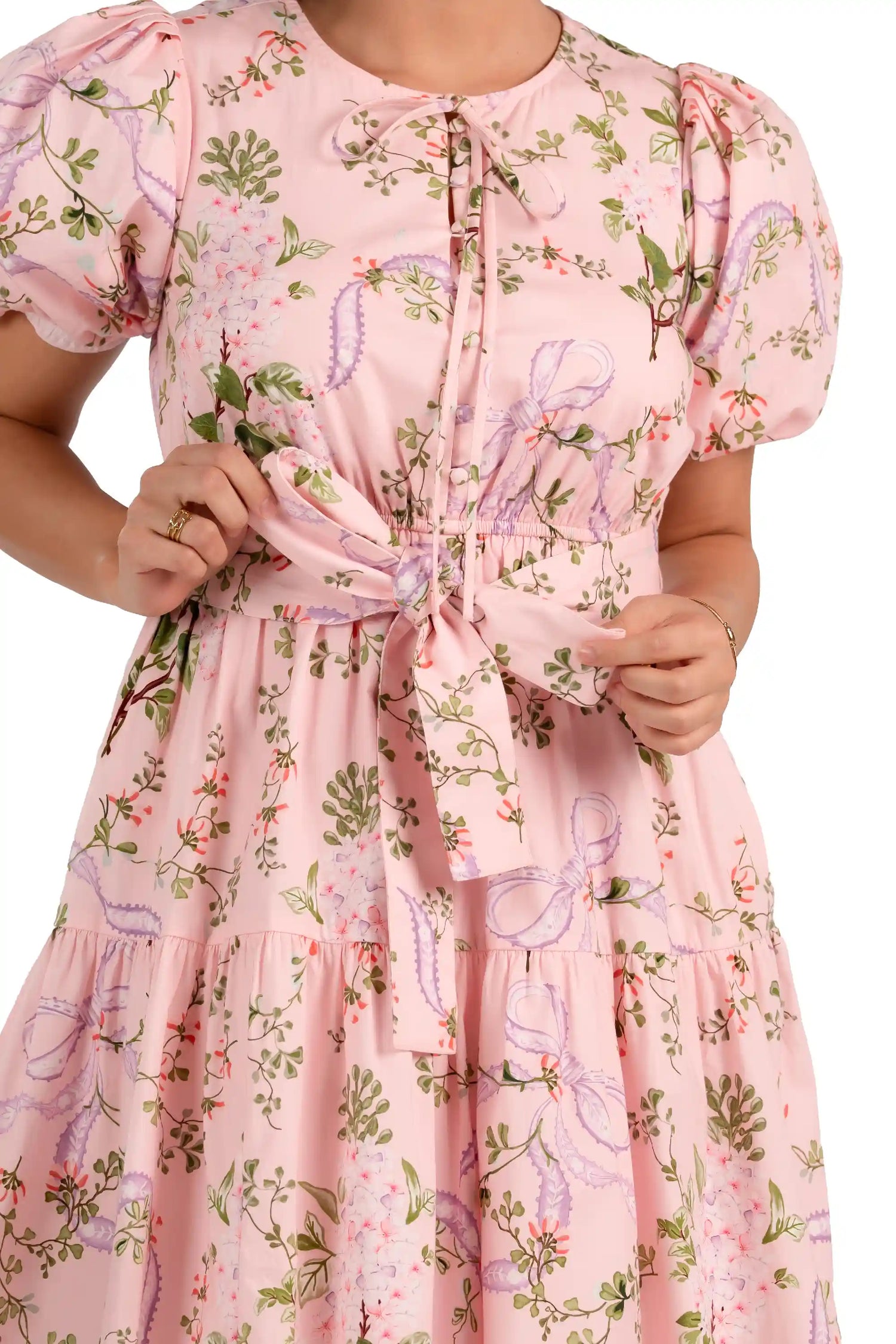 Pink floral bow mini dress waist tie detail, puff sleeves and buttons