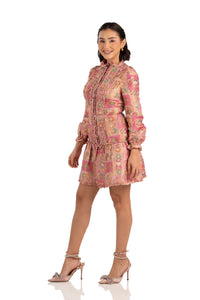 Pink patchwork ruffle mini dress, side-left view with belt and cuffs