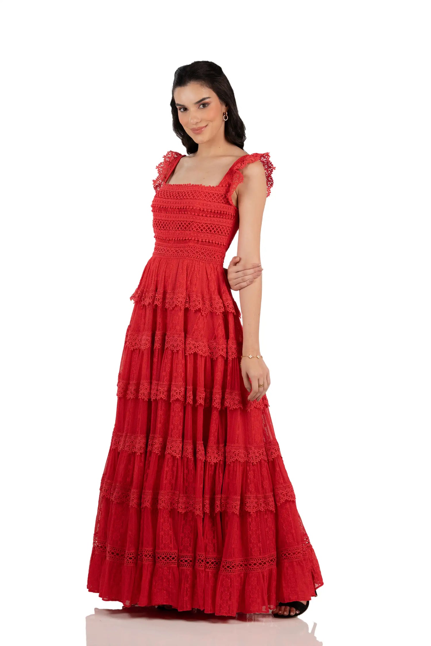 Front view of women’s red tiered lace maxi dress with flutter straps, square neck.