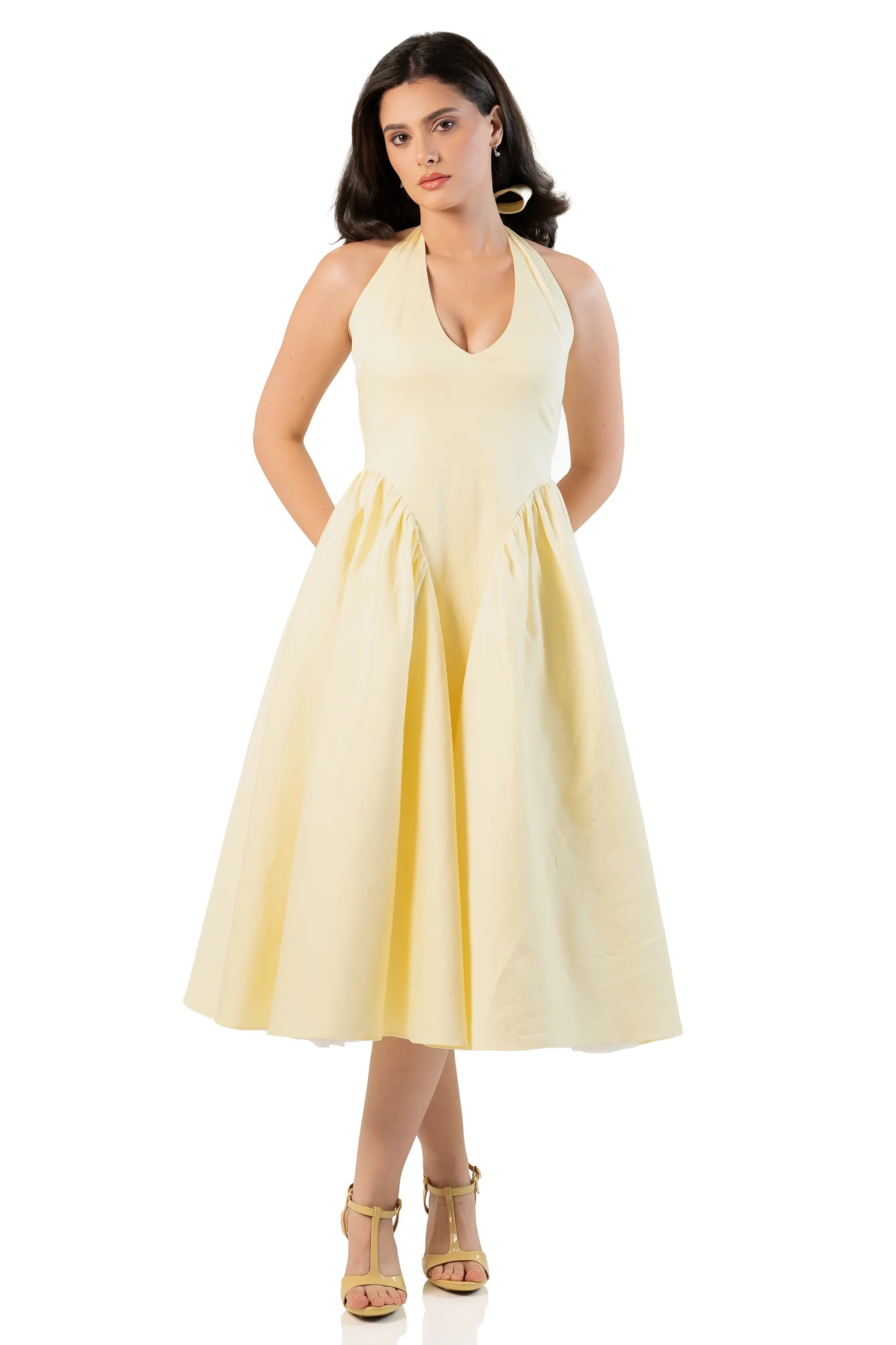 Front view: yellow halter midi dress with flared A-line skirt