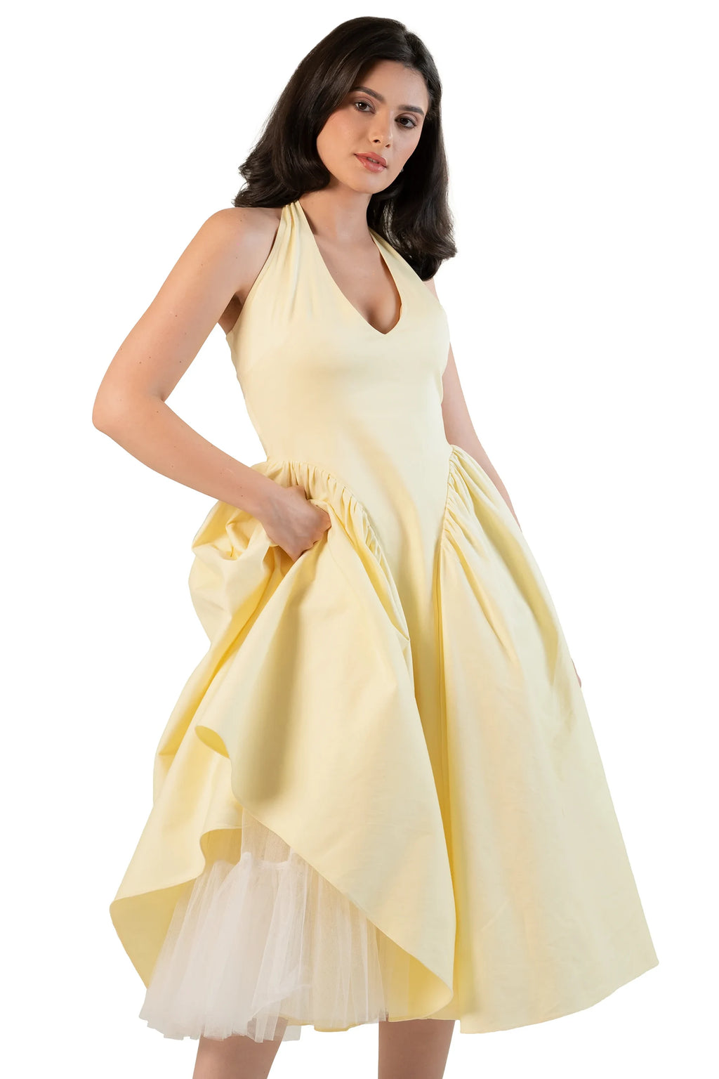 Underskirt detail: yellow halter midi dress with pockets and tulle